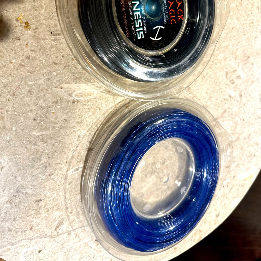 3 Reels of the Blue Typhoon Tennis String by Genesis.